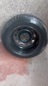 Inzerát č. 140685 - Prodám pneu s plechovým diskem Dunlop 205/65 R15. Používa...